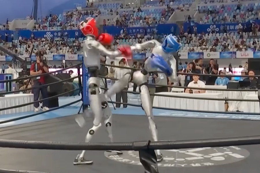 China's robot Olympics sees humanoid robots sprint, fight and perform Tai Chi