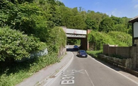 Road closed while authorities respond to gas leak